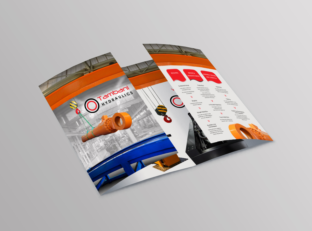 Tambani Hydraulics collateral mockup showing industrial brochure pages with machinery imagery, technical information and orange, red and black graphic elements.