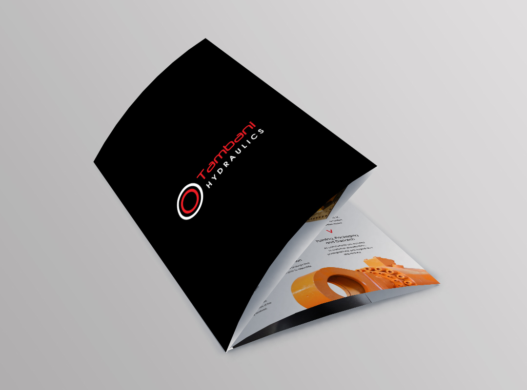Tambani Hydraulics collateral mockup showing industrial brochure pages with machinery imagery, technical information and orange, red and black graphic elements.