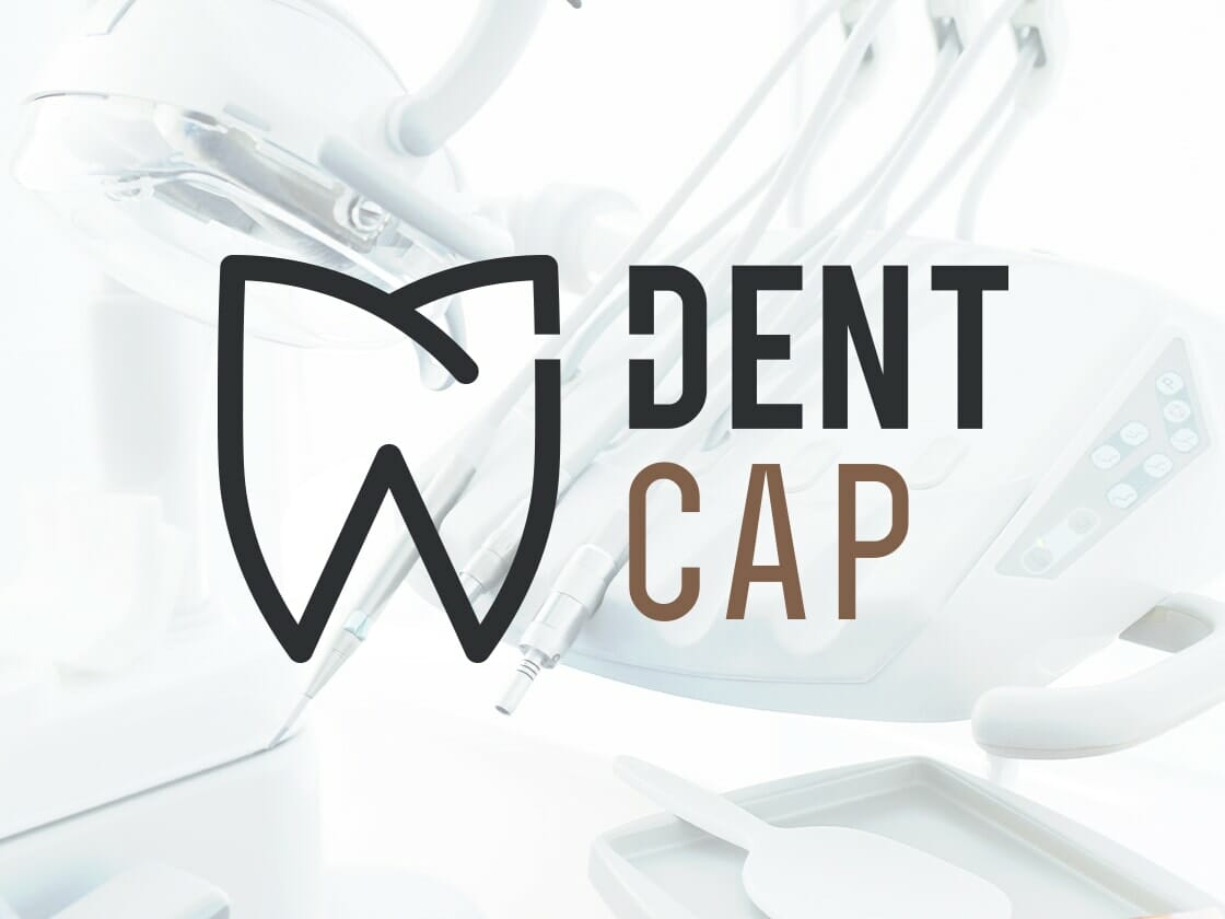 A logo for DentCap, a dental clinic, overlaying a background image of dental equipment. The logo features a stylized tooth outline followed by the text "DENT" in bold black letters and "CAP" in bold brown letters. The background shows various dental tools in a clean, clinical setting.