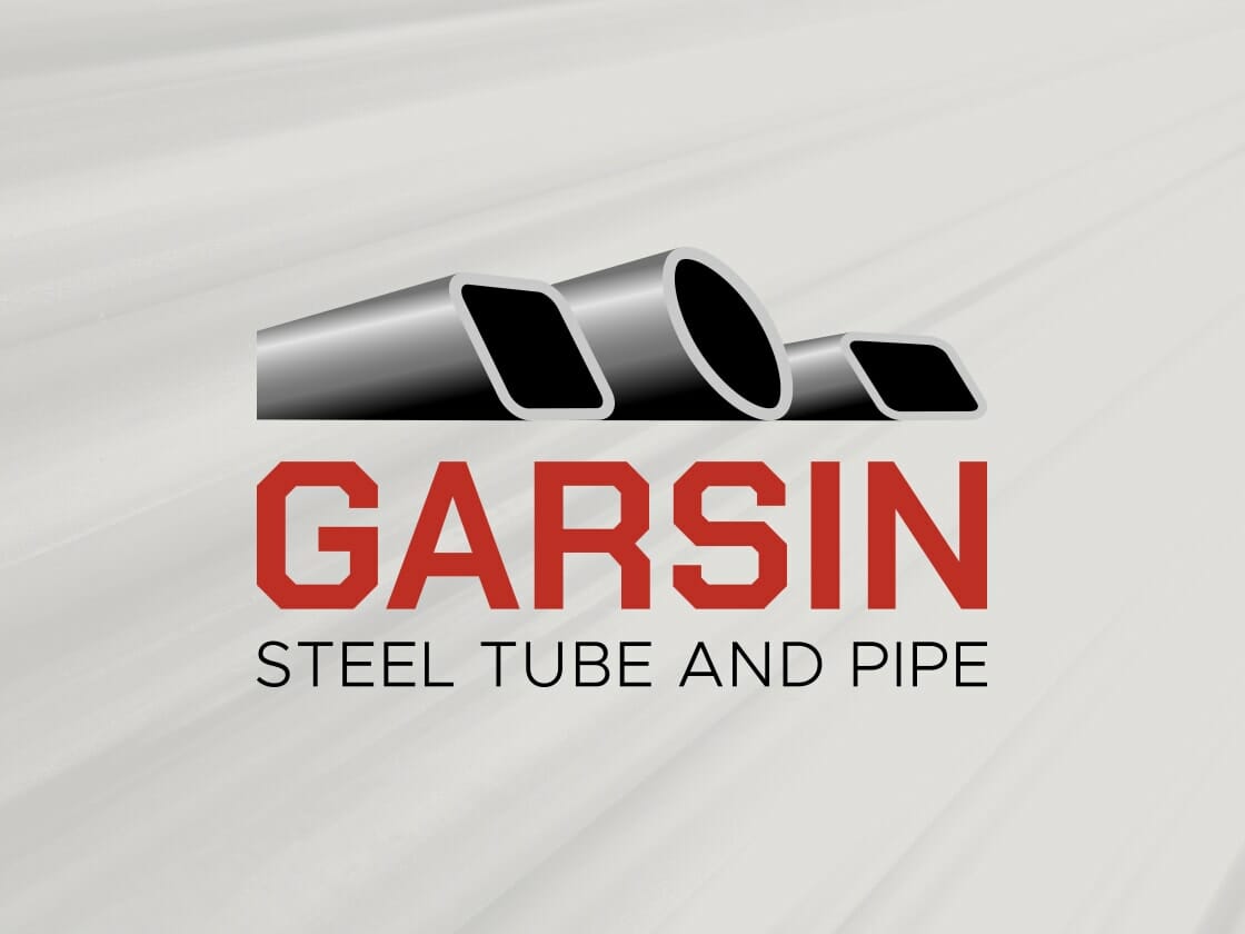 Logo with text "GARSIN STEEL TUBE AND PIPE" in bold red and black letters. Above, three steel tubes—rectangular, circular, and square—angle upward-right. The background features a dynamic light gray gradient with streaked patterns, reflecting Garsin's precision in the steel tube and pipe industry.