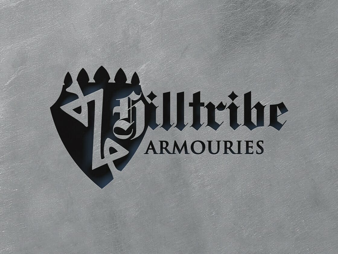 A logo featuring a black shield with a stylized silver "Z" and three triangular shapes protruding from the top. To the right of the shield, the text "Zilltribe" in a bold, gothic font and below it, "ARMOURIES" in capitals are displayed against a textured gray background.