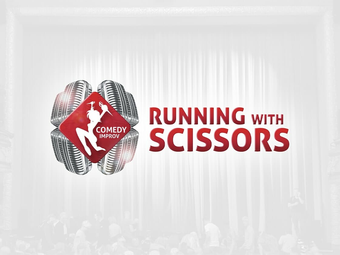 A red diamond-shaped logo with a white silhouette of a person holding scissors and the text "COMEDY IMPROV" is on the left. Surrounding this are four microphone graphics. To the right, bold red text reads "RUNNING WITH SCISSORS." The background features a blurred image of people in a theater setting.