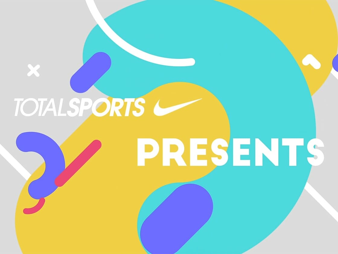 A dynamic, colorful graphic with abstract shapes in blue, yellow, and green on a light background. The text "TOTALSPORTS" and "PRESENTS" is prominently displayed in white uppercase letters, with a white Nike logo placed between the words. Additional small shapes and lines accent the design concept.