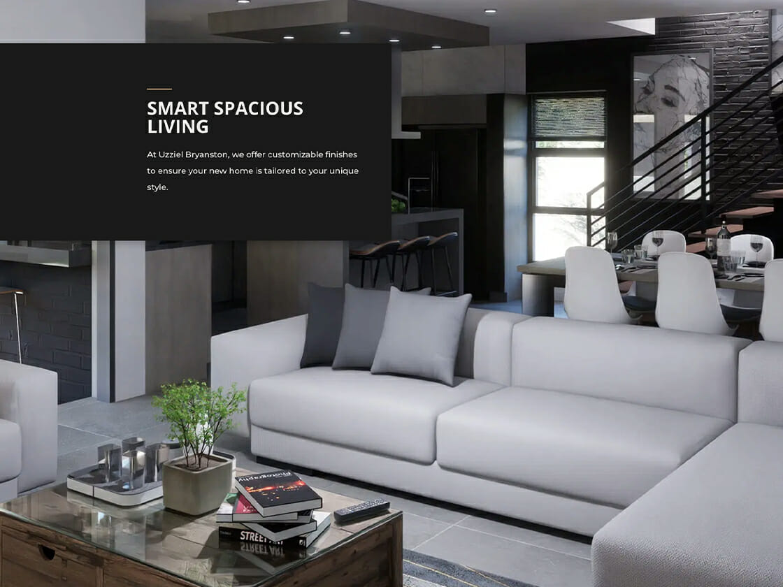 Modern living room interior with sleek furniture and contemporary design, featuring a staircase, artwork, and a home office setup in the background.