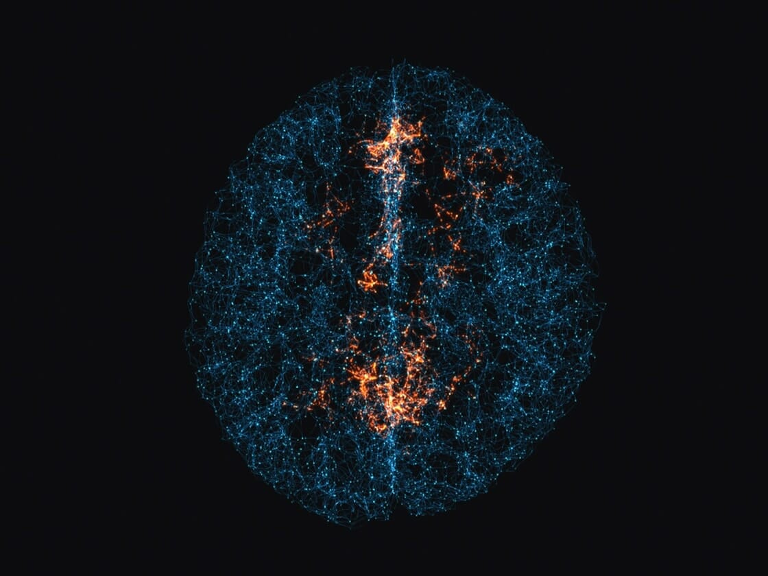 A visual representation of a complex network structure with a central core highlighted in bright orange against a dark background.