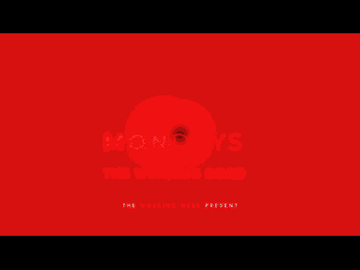 Abstract red background symbolizing Mondays, with blurry white text and a clear focal point near the center, representing the start of the working week.