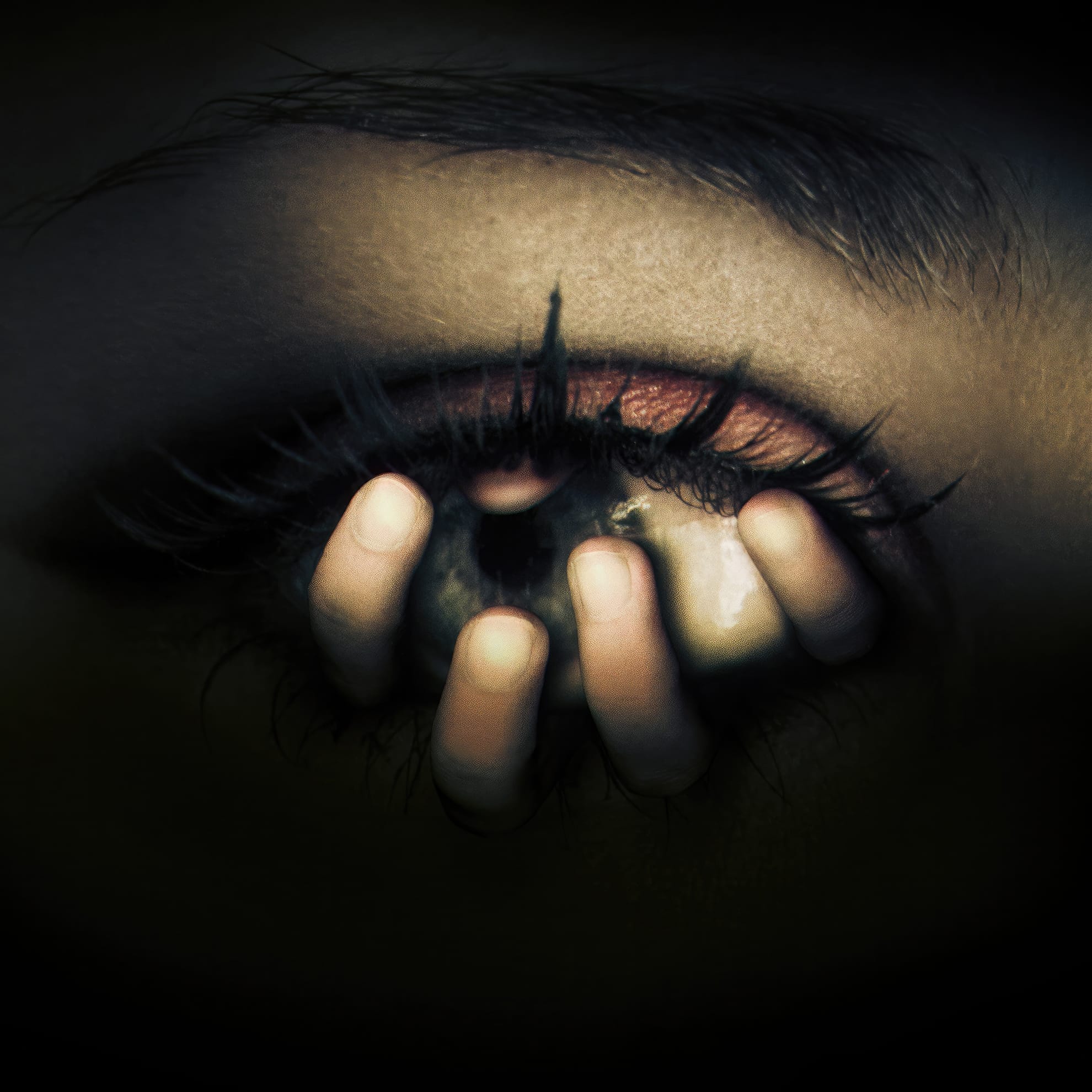 A surreal image depicts a close-up of an eye with fingers emerging from the pupil, as if pushing out of my way. The skin around the eye is dark and shadowy, adding a mysterious and eerie atmosphere. The lashes are long and prominent, while the fingers appear to be grasping outward from the center of the eye.